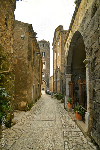 A narrow street among the old stone houses of the oldest district of the city of Caserta.