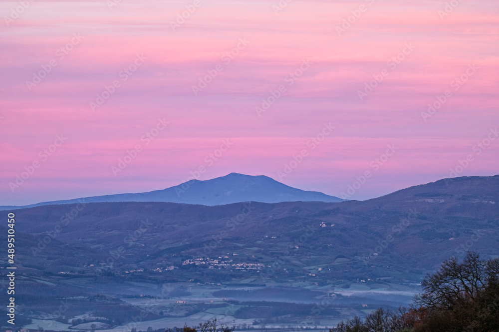 Pink Sunrise over Tuscany Mountains in Winter