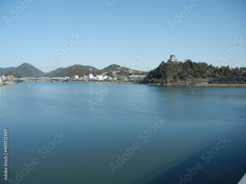 A scene of Inuyama-jyo Castle and Kiso-gawa River flowing through Inuyama City in Aichi Pref.ecture in Japan 日本の愛知県犬山市を流れるの木曽川と犬山城の一風景
