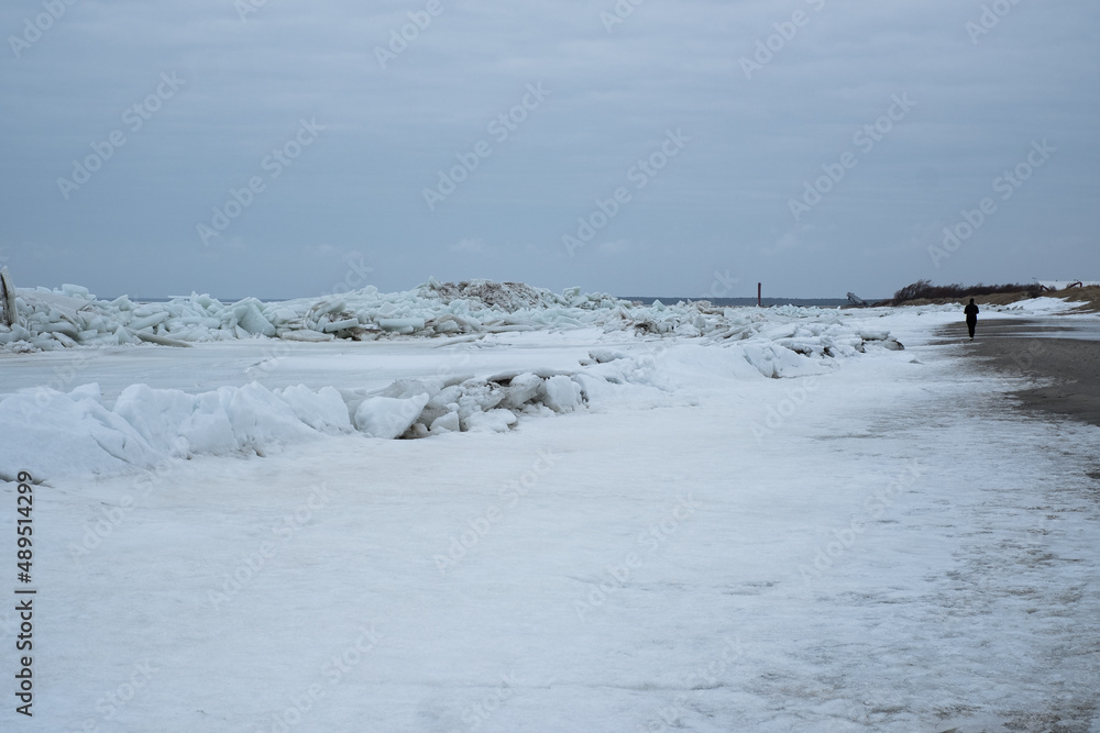 Frozen sea. Huge broken ice blocks stacked up on coast. Stormy weather in Pärnu beach. Frozen sea. Huge broken ice blocks stacked up on coast. Stormy weather in Pärnu beach.