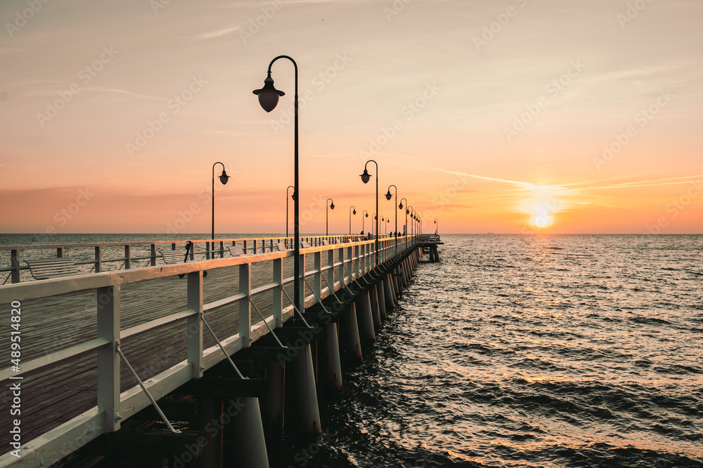 Gdynia Orlowo pier in the morning with colors of sunrise. Baltic Sea, Poland