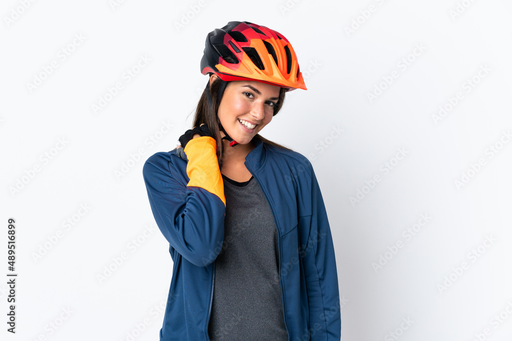 Young cyclist brazilian girl isolated on white background laughing Young cyclist brazilian girl isolated on white background laughing