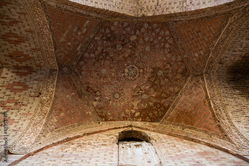 mosaics and ornaments on the walls and ceilings of the Soltaniyeh Mosque in Iran photo