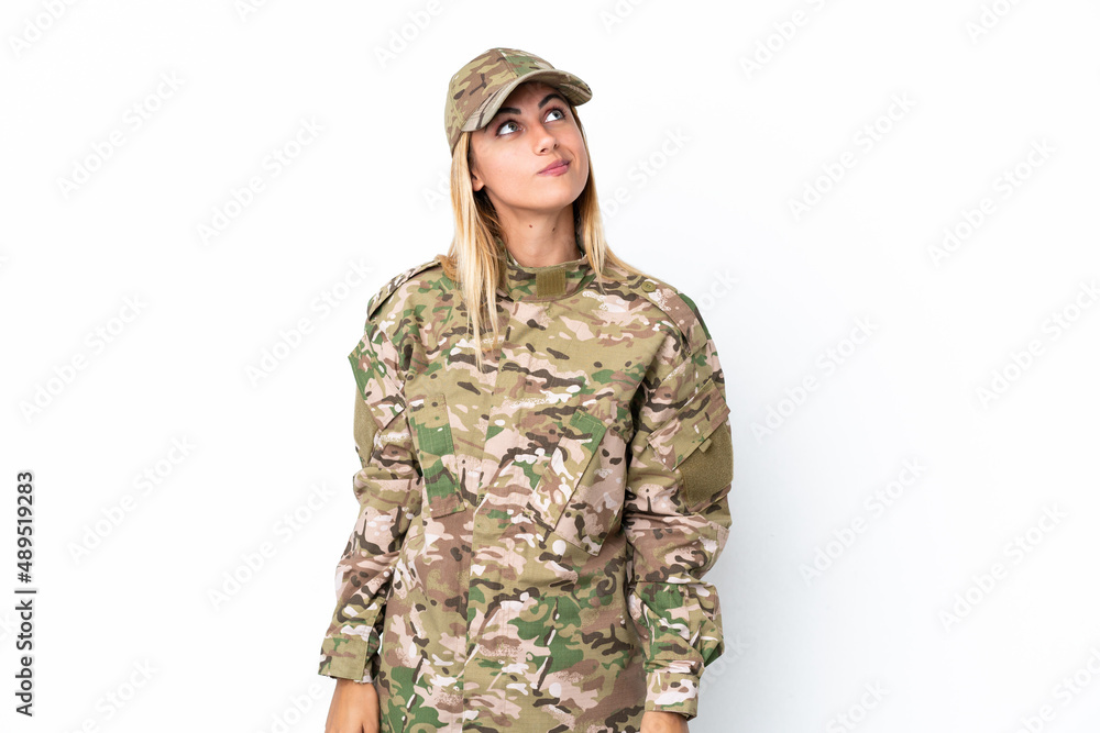 Military woman isolated on white background and looking up