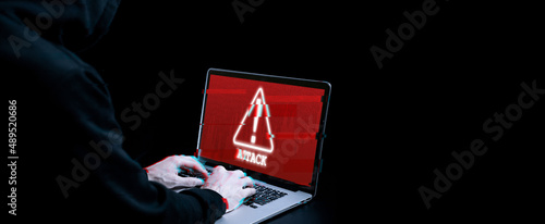 Fototapeta Naklejka Na Ścianę i Meble -  Hacker attack cyber security. Digital laptop in hacker man hand isolated on black. Blurred Internet web hack technology with glitch effect. Login and password, cybersecurity banner concept.