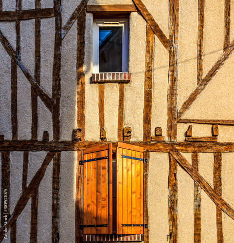 Windows of a traditional half timbered rural house in Brou, a small town located in Eure et Loir Department in Central France.  photo