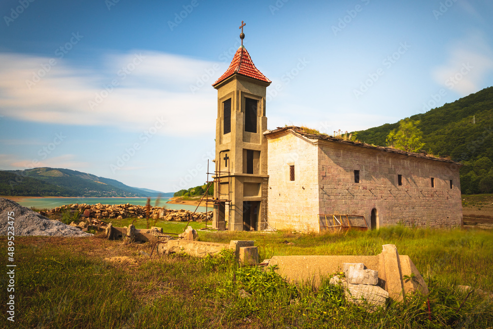St Nicholas Church is an abandoned church in Mavrovo, North Macedonia which is submerged in Mavrovo Lake. Built in 1850 with icons painted by Dicho Zograf St Nicholas Church is an abandoned church in Mavrovo, North Macedonia which is submerged in Mavrovo Lake. Built in 1850 with icons painted by Dicho Zograf