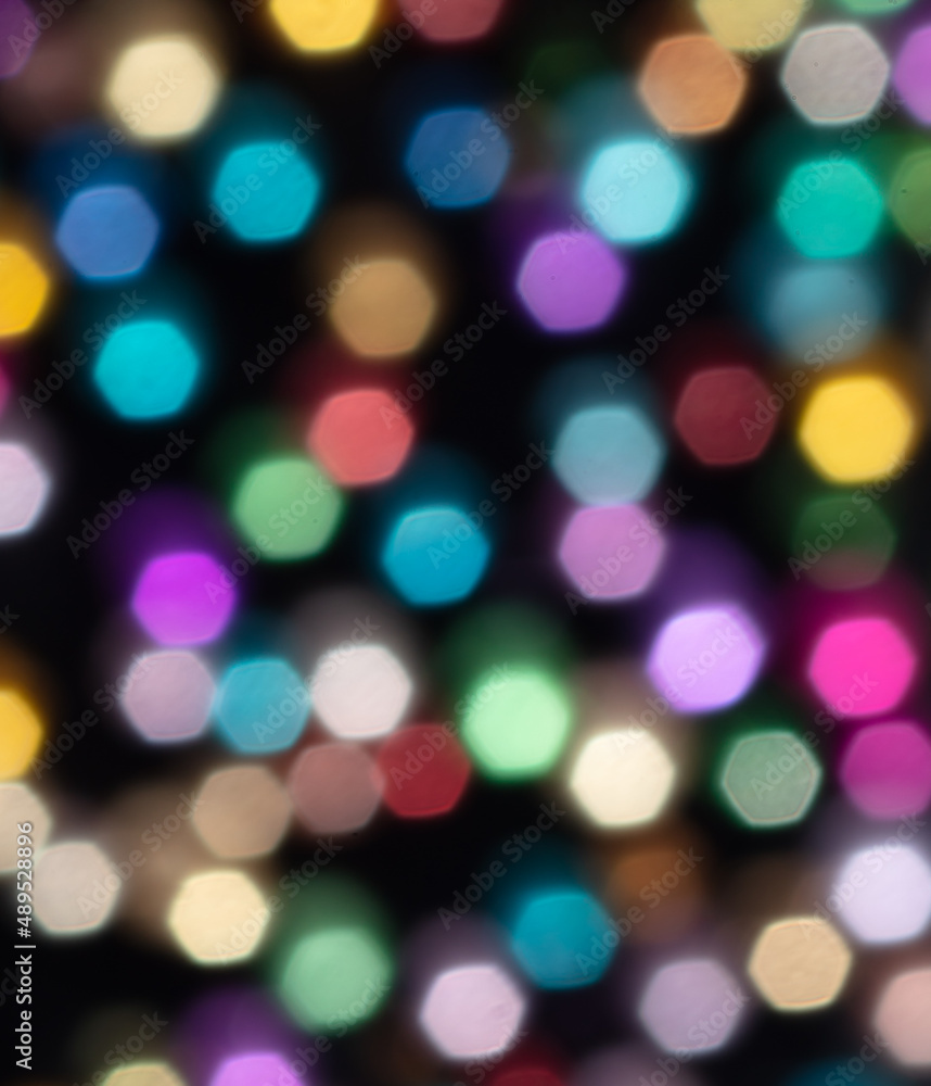 Multicolored festive bokeh as background. Multicolored festive bokeh as background.