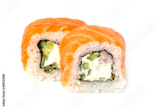 Sushi with salmon and cucumber on a white background.