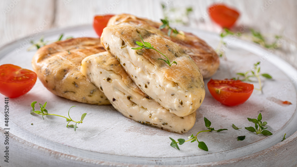 Delicious grilled halloumi cheese seasoned with herbs and pepper.