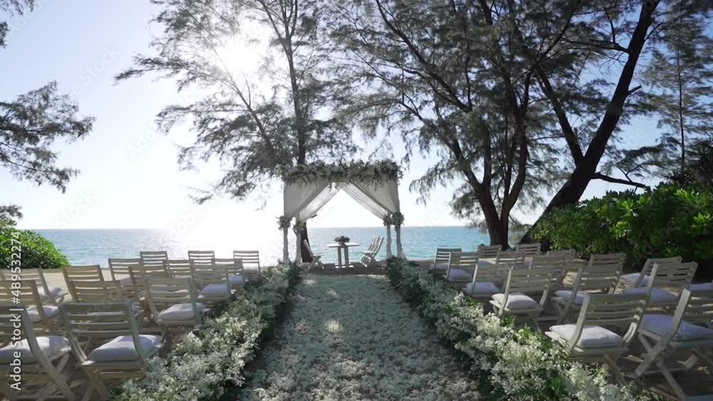 Wedding venue beach with floral decorations arch. Wedding venue beach with floral decorations arch.