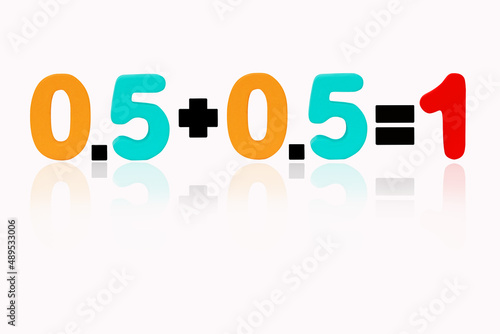 Zero point five plus zero point five equals one Isolated on white background. Image of simple math addition operation for kids, Colorful wooden alphabet set sort. Poster, banner design.
