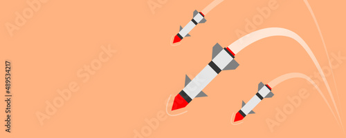 Missile rocket warhead launch frying in war with orange background copy space banner flat vector design.