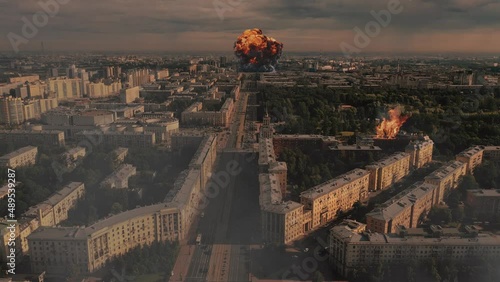 AERIAL. View of huge explosions and fire at the big city. Missile attacks 