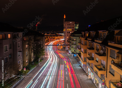 Zurich, Switzerland - December 30, 2021: Night light trails in direction of Hardbrucke in Zurich