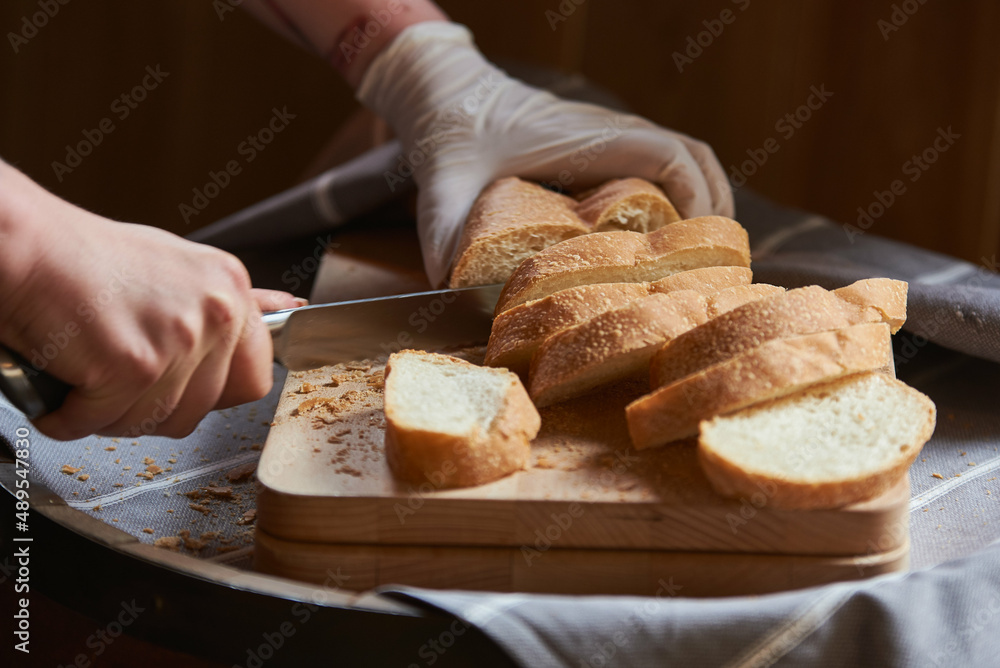 fresh sliced bread on a wooden board