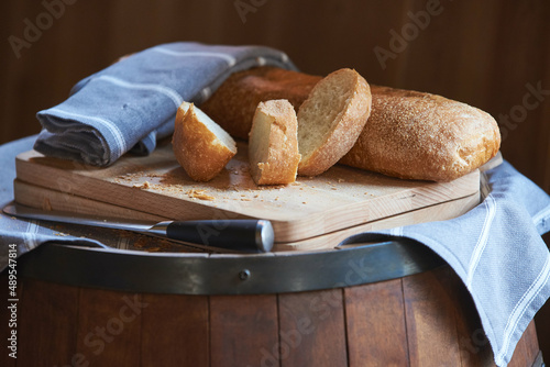 fresh sliced bread on a wooden board