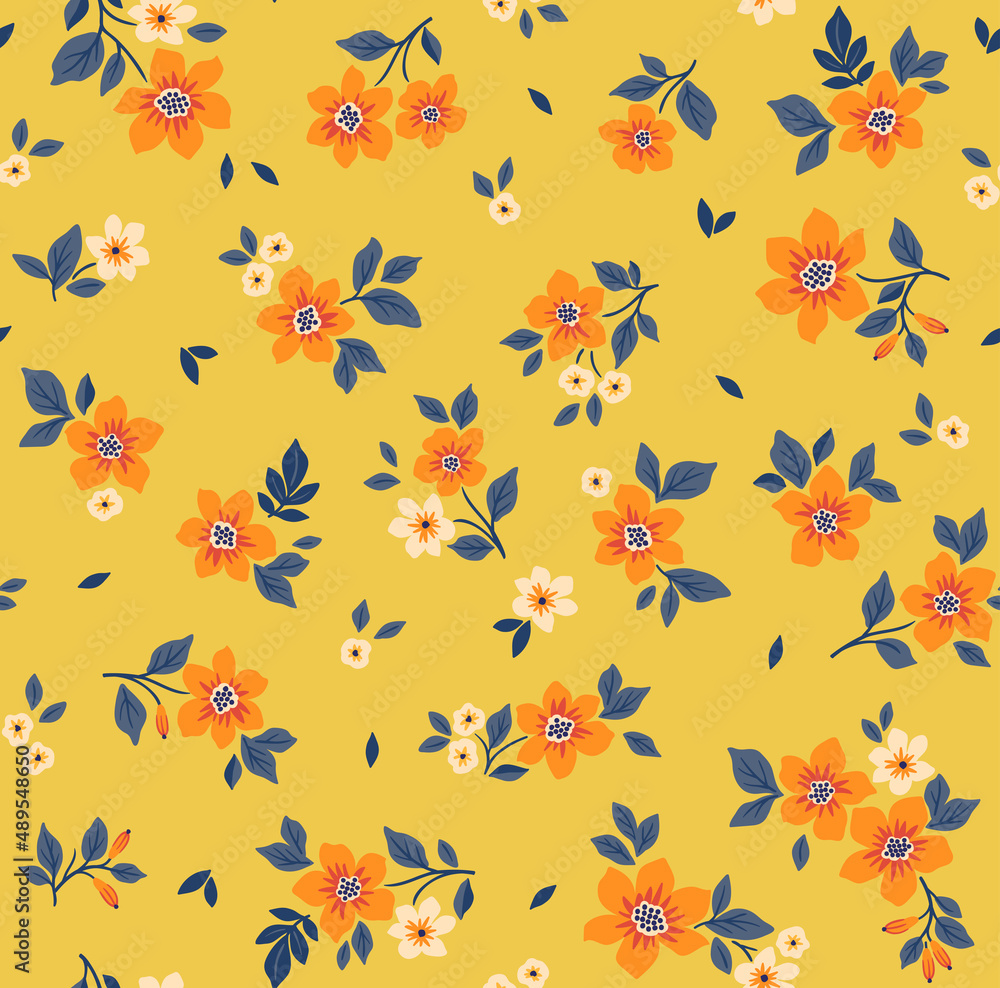 Beautiful floral pattern in small abstract flowers. Small orange flowers. Yellow background. Ditsy print. Floral seamless background. The elegant the template for fashion prints. Stock pattern.