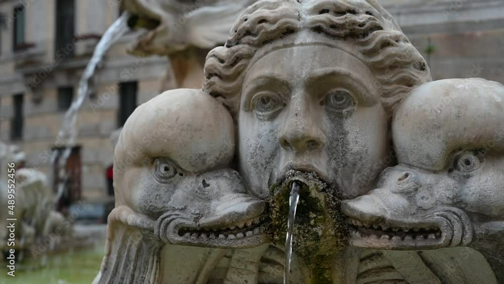 Antique travertine fountain with fish sculptures on piazza Rotonda outside temple of gods Pantheon Antique travertine fountain with fish sculptures on piazza Rotonda outside temple of gods Pantheon