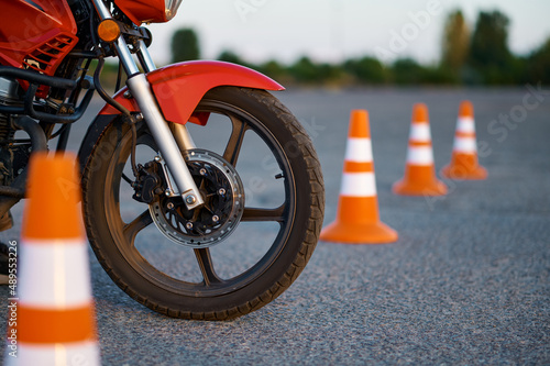 Motorbike and cones, motordrome, motorcycle school photo