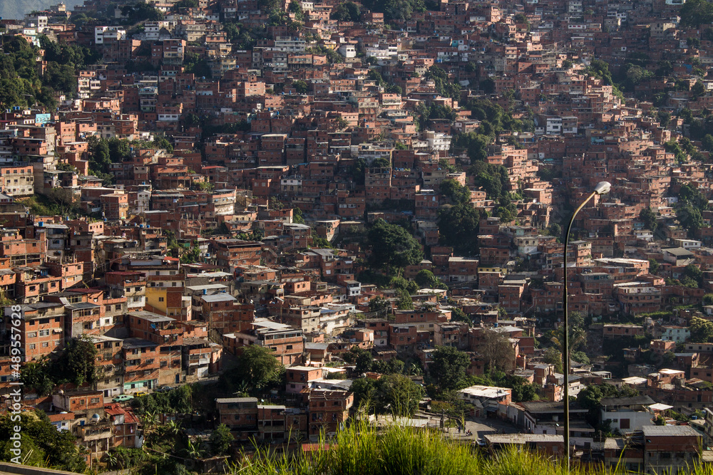Traveling through Venezuela, the architecture of Petare, a Caracas neighborhood with red brick houses built on the mountain