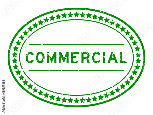 Grunge green commercial word oval rubber seal stamp on white background