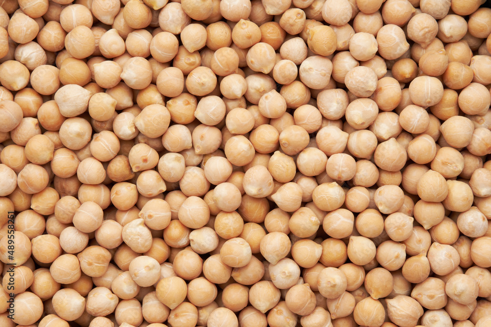 Raw chickpeas background. Chickpeas texture, top view. Raw chickpeas background. Chickpeas texture, top view.