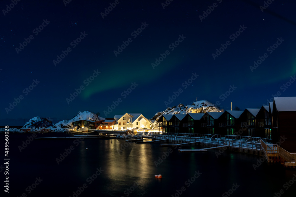 northern lights above village Hamn on Senja island in Norway on a clear cold winter day