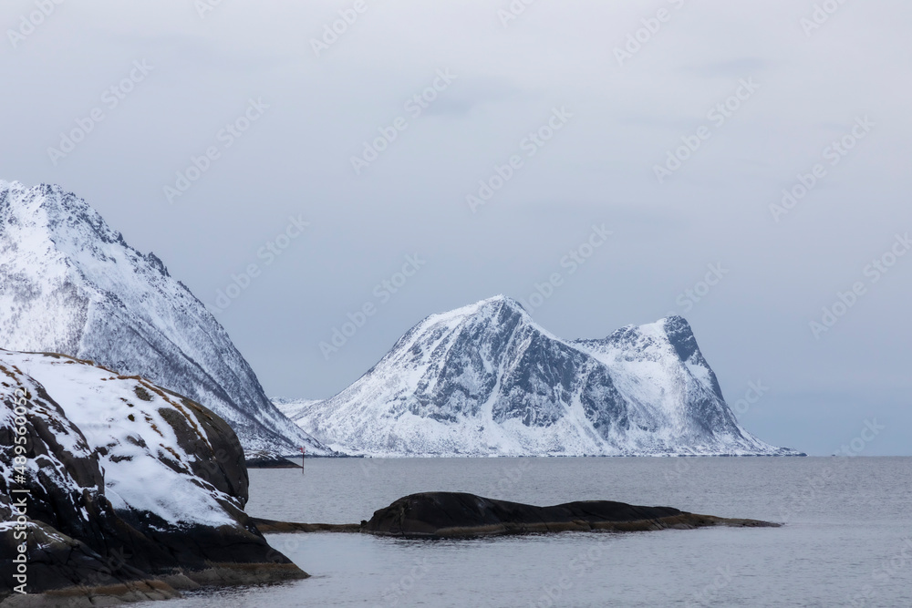 coastline near village Hamn on Senja island in Norway on a clear cold winter day