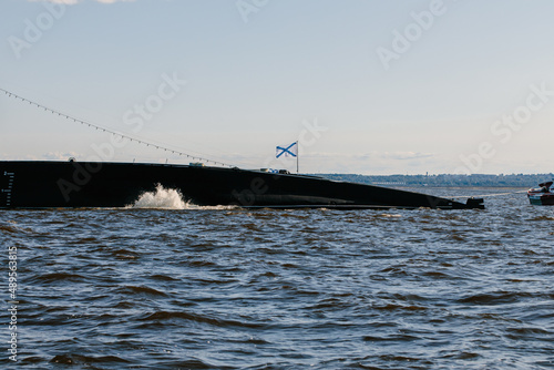 View from the water of the Russian diesel-electric submarine Dmitrov in the waters of the Gulf of Finland before the parade.Russia,Kronstadt,31.07.2021 photo