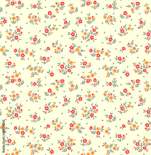 Spring flowers print. Vector seamless floral pattern. Floral design for fashion prints. Endless print made of small yellow and red flowers. Elegant template. Ivory background. Stock vector.