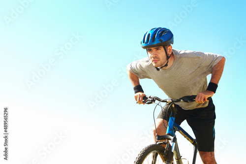 Cyclist in training. Cropped shot of a handsome young cyclist outdoors.