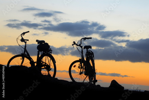 two bikes mountain sunset landscape