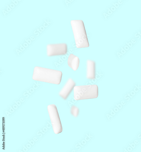 White gum pads levitates on a blue background