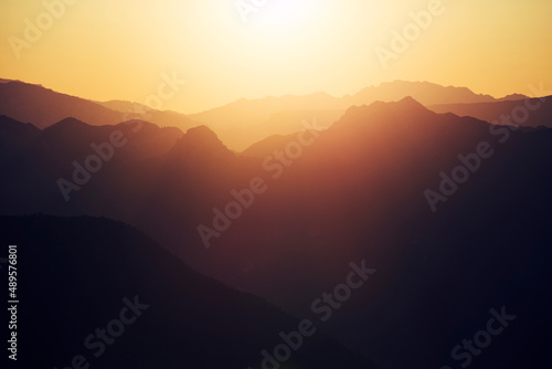 sunset in the mountains with lens glare