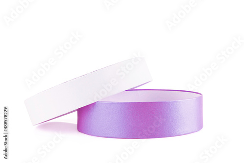 Open empty round cardboard gift box on a white background isolated  front view  close-up  copy space. Boxing day.