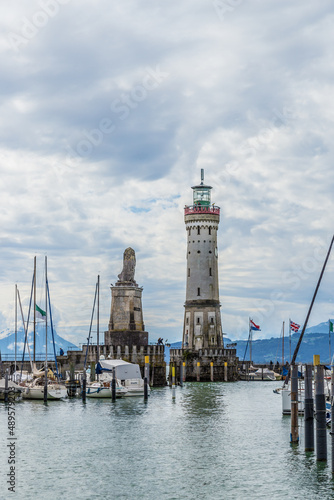 Lindau, Germany. Lighthouse and figure of a lion (19th century) at the entrance to the harbor