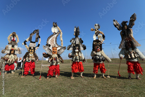 Masquerade festival in Elin Pelin, Bulgaria. People with mask called Kukeri dance and perform to scare the evil spirits.  © georgidimitrov70
