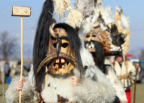 Masquerade festival in Elin Pelin, Bulgaria. People with mask called Kukeri dance and perform to scare the evil spirits.
 photo