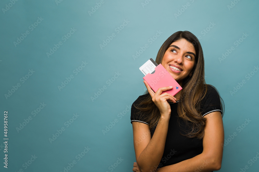 Latin woman thinking about her trip Latin woman thinking about her trip