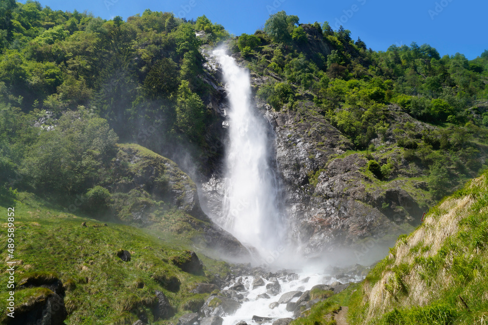 Fototapeta premium a breathtaking alpine view of Parcines waterfall and the alpine valley in the Italian Alps in Parcines (or Partschins) in the Rabla, Tel region (Merano, Rabla or Rabland, Tel, South Tyrol, Italy)