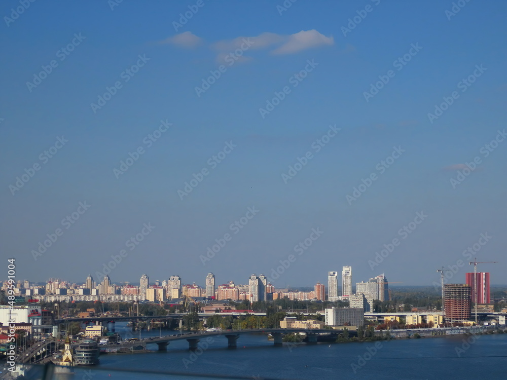 Beautiful panoramic view of the left bank of the Dnieper in the capital of Ukraine in Kyiv.