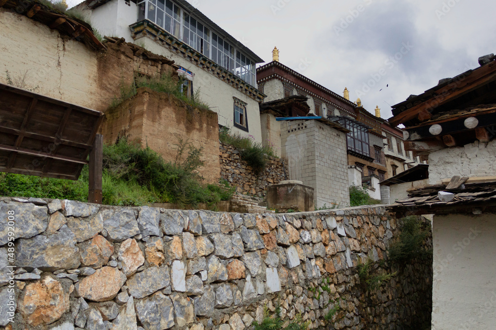 ancient wall and buildings in Ganden Sumtseling Gompa near Shangri-La, Yunnan, China ancient wall and buildings in Ganden Sumtseling Gompa near Shangri-La, Yunnan, China