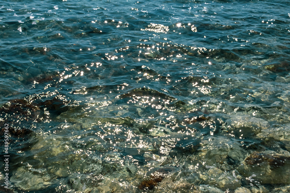 rippled shining aquamarine sea water  