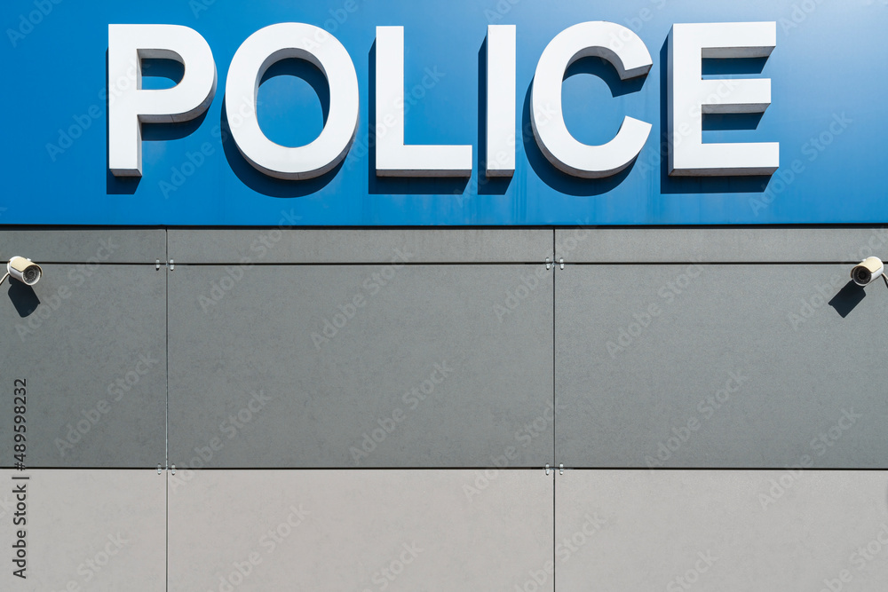 the inscription police on the facade of the building the inscription police on the facade of the building