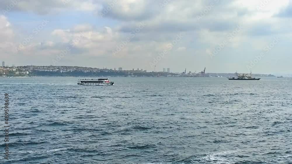 Cruise ferries with passengers crossing the Bosporus in Istanbul Cruise ferries with passengers crossing the Bosporus in Istanbul