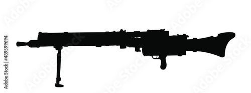 Machine gun vector silhouette illustration isolated on white background. Deadly powerful army weapon. Military rifle symbol. photo