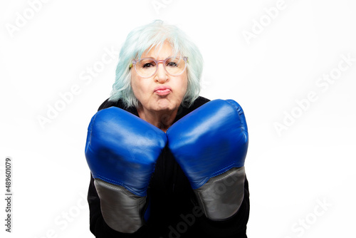senior woman with boxing gloves © DondykRiga