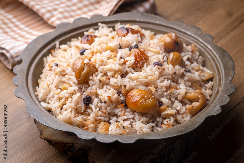 Traditional delicious Turkish food; chestnut rice pilaf (Turkish name; kestaneli pilav) Traditional delicious Turkish food; chestnut rice pilaf (Turkish name; kestaneli pilav)