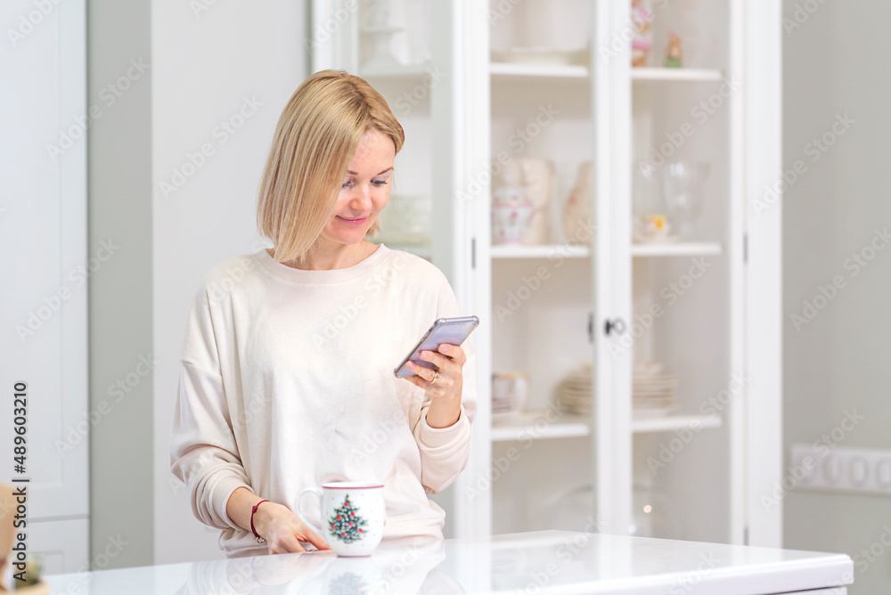 Young girl calling and talking on mobile phone at home Young girl calling and talking on mobile phone at home